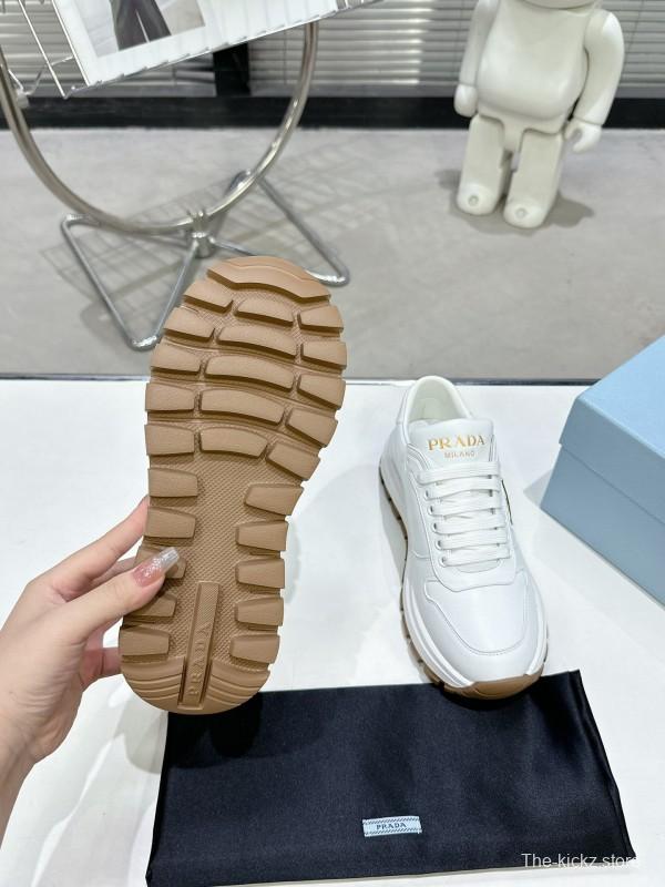 2025 Women Prada White Cow Leather Lambskin Sneakers KFY00310